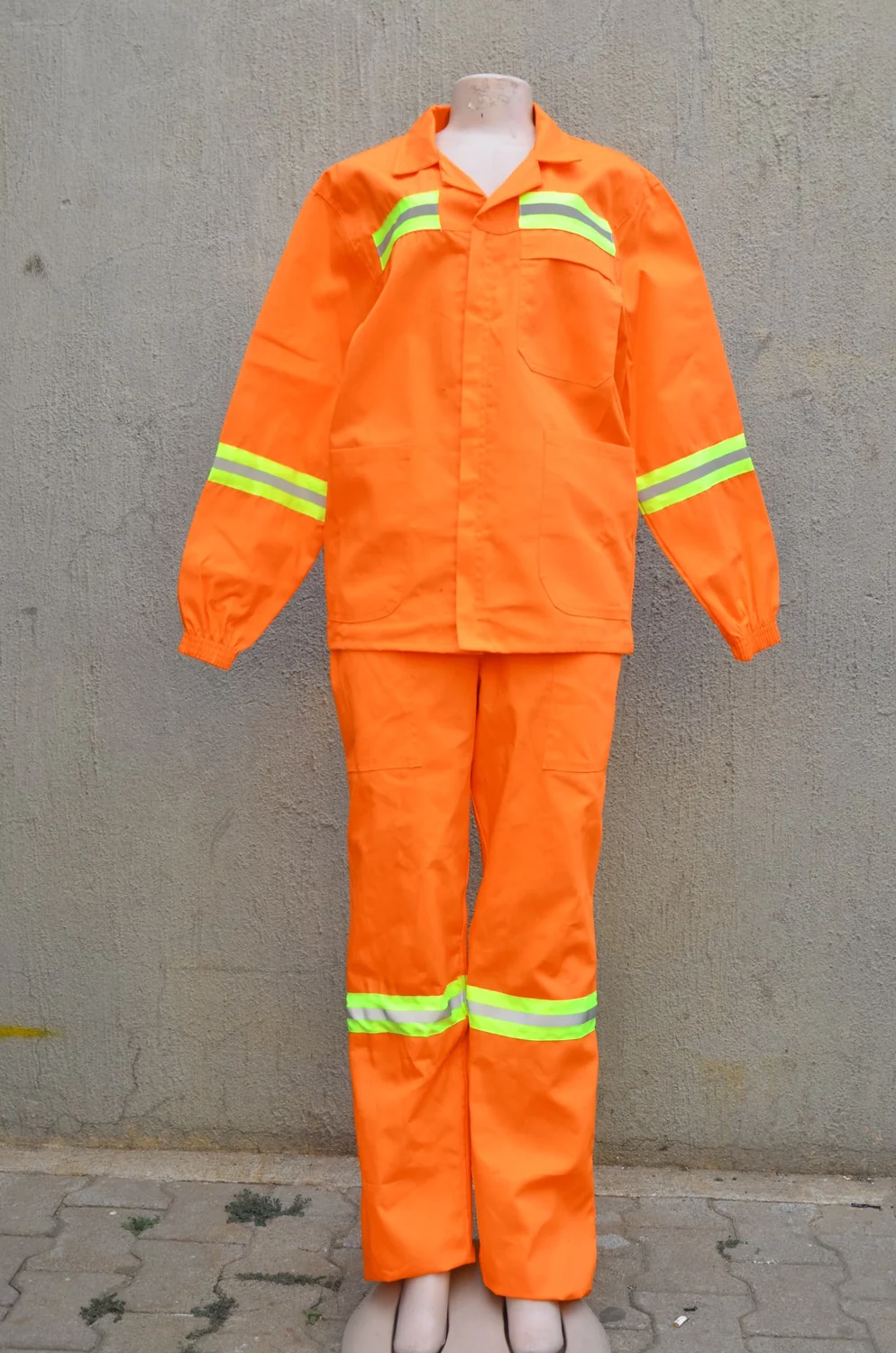 Orange overalls with lime reflective bands