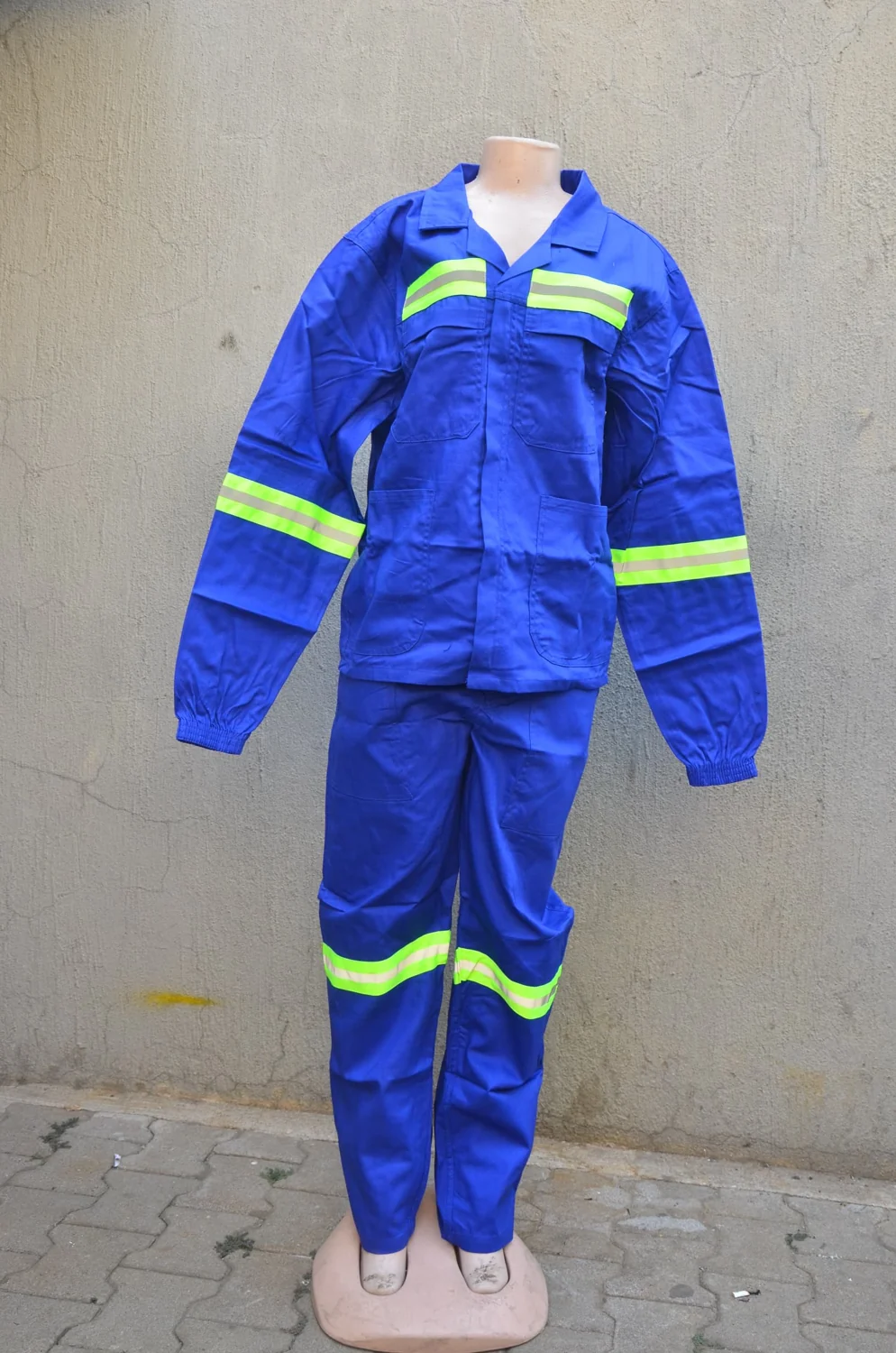 Royal blue overalls with lime reflective bands